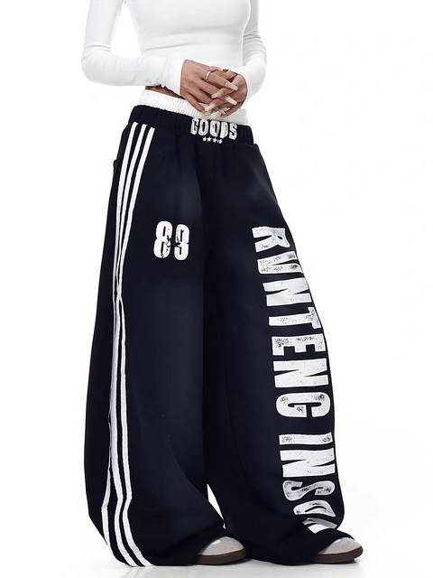 GKIKZ X RVNTENG™ GRAPHIC STRIPE WIDE-LEG TRACK PANTS