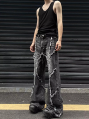 GKIKZ DECONSTRUCTED TESSEL RAW-EDGE BAGGY JEANS