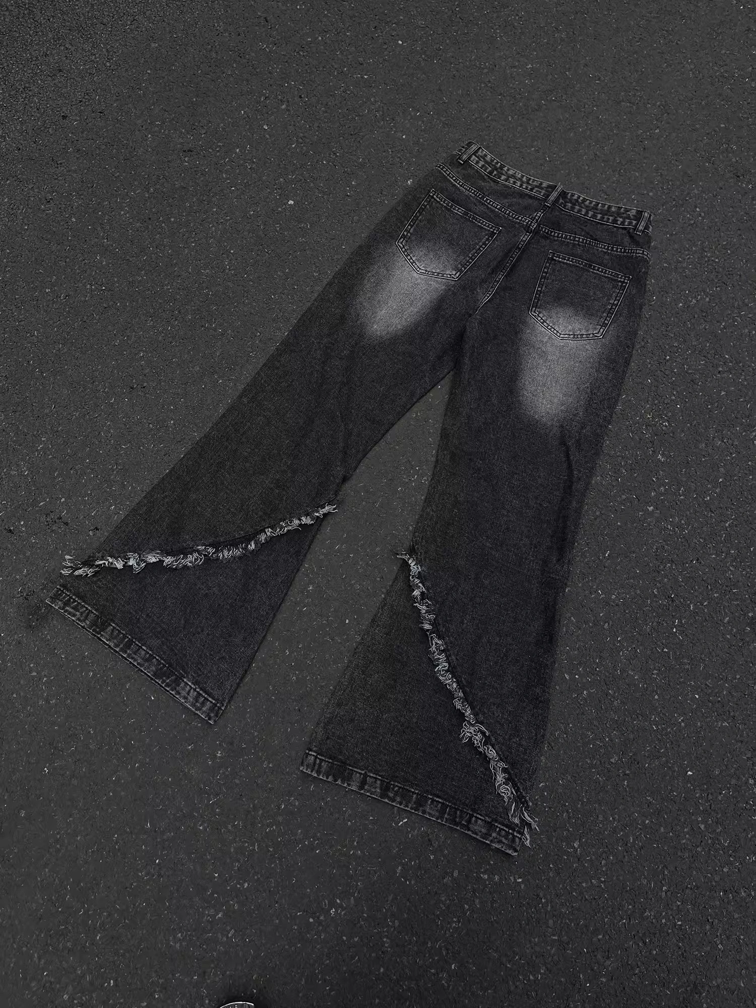 GKIKZ DECONSTRUCTED TESSEL RAW-EDGE BAGGY JEANS