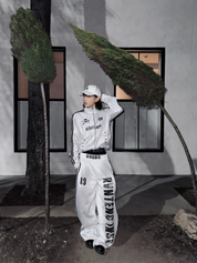 GKIKZ X RVNTENG™ GRAPHIC STRIPE WIDE-LEG TRACK PANTS