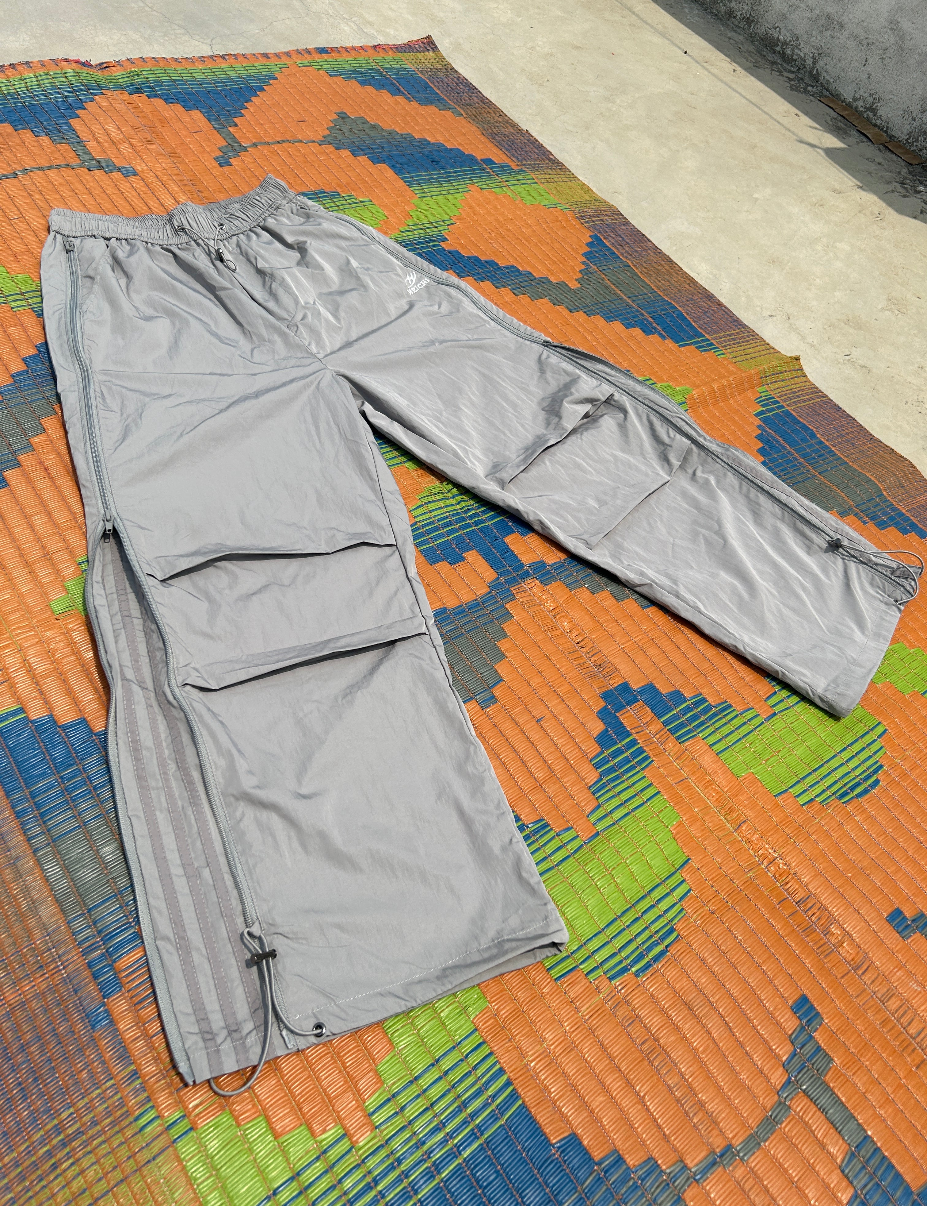 [25SS RESTOCKS] GKIKZ SIDE-ZIP BLOCK COLOUR'S EXTENDABLE CARGO PANTS