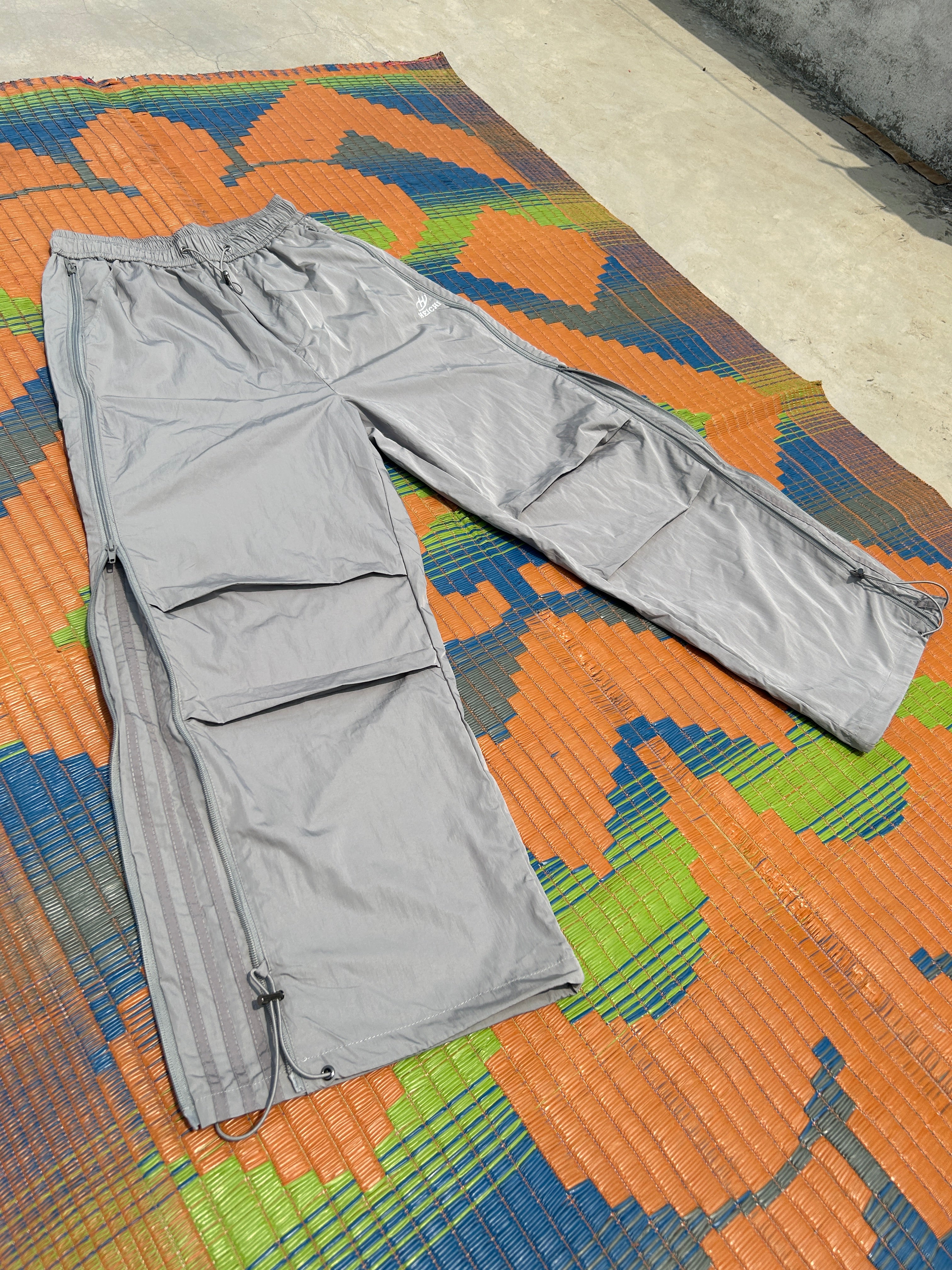 [25SS RESTOCKS] GKIKZ SIDE-ZIP BLOCK COLOUR'S EXTENDABLE CARGO PANTS