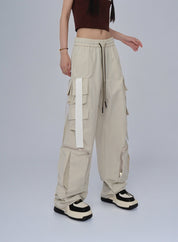 GKIKZ LOOSE STRAPS SIDE ZIP CARGO PANTS