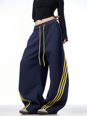 GKIKZ TRI-STRIPE SCIMITAR BAGGY PANTS