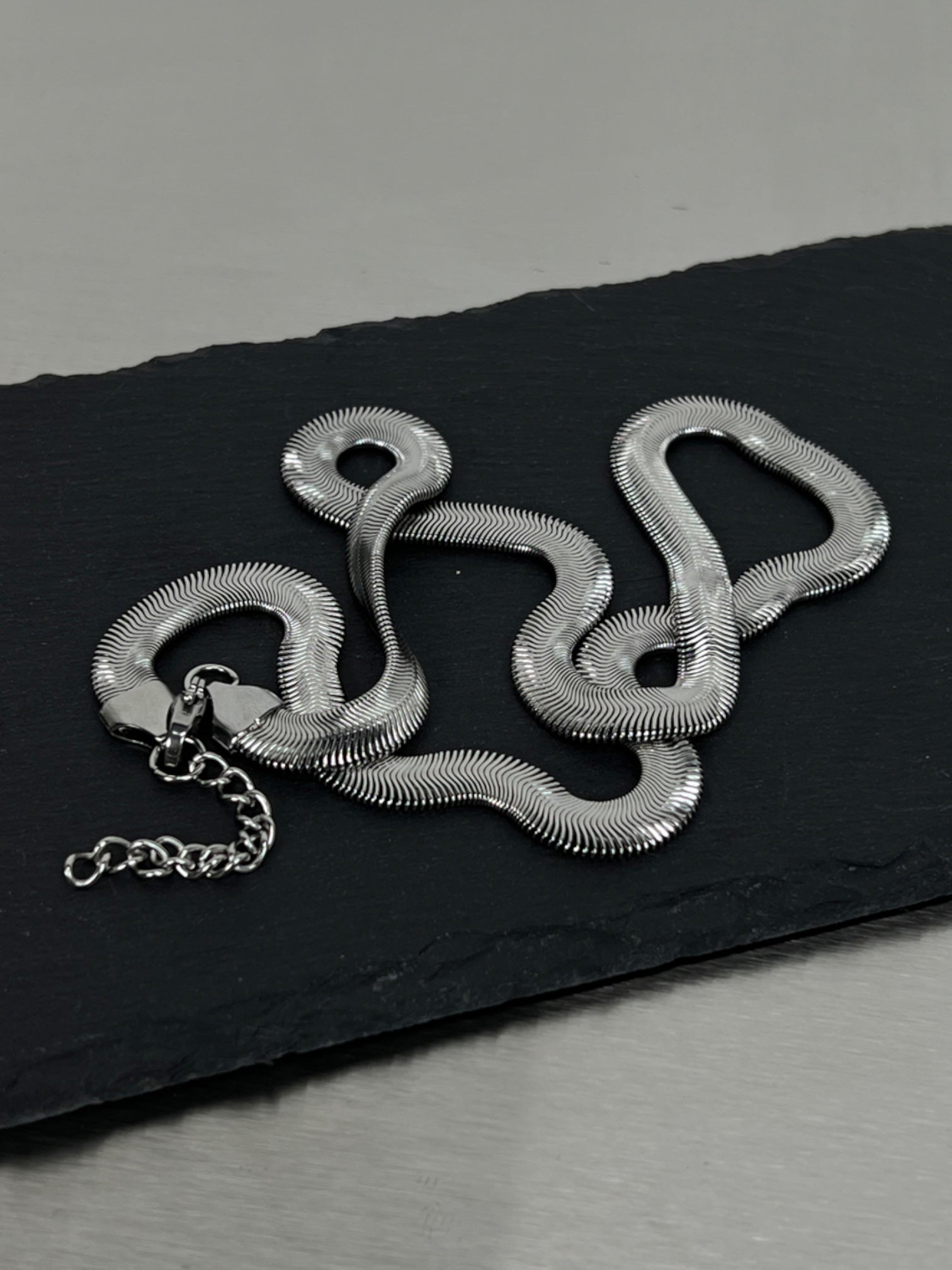 Monoflex Silver Serpent Titanium Necklace