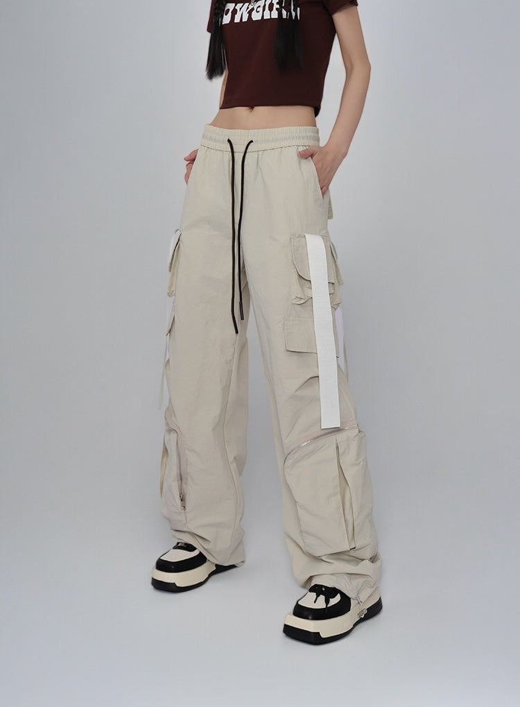 GKIKZ LOOSE STRAPS SIDE ZIP CARGO PANTS