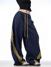 GKIKZ TRI-STRIPE SCIMITAR BAGGY PANTS