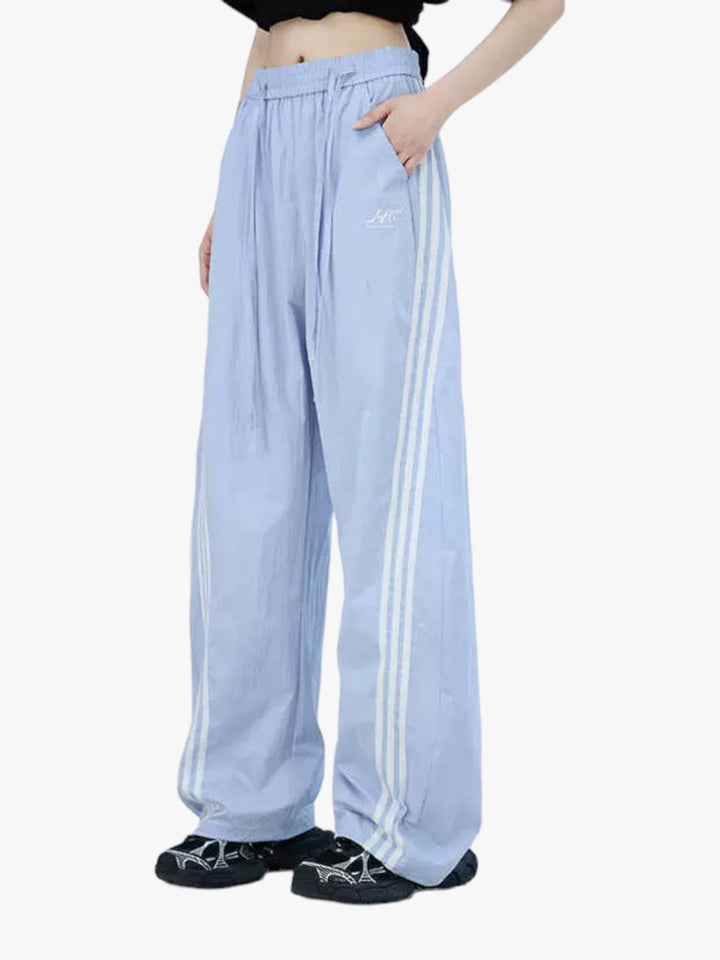 [25SS RESTOCKS] GKIKZ DUAL LACES TRI-STRIPE CURVE WIDE LEG PANTS