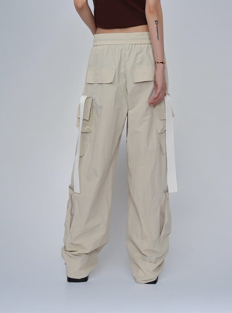 GKIKZ LOOSE STRAPS SIDE ZIP CARGO PANTS