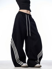 GKIKZ TRI-STRIPE SCIMITAR BAGGY PANTS