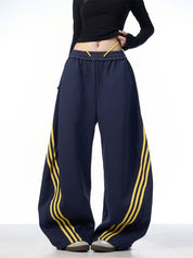 GKIKZ TRI-STRIPE SCIMITAR BAGGY PANTS