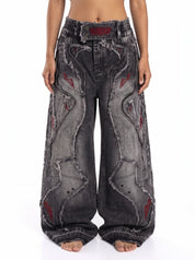 Raw-Edge Embroidered Distressed Jeans