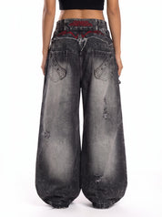 Raw-Edge Embroidered Distressed Jeans