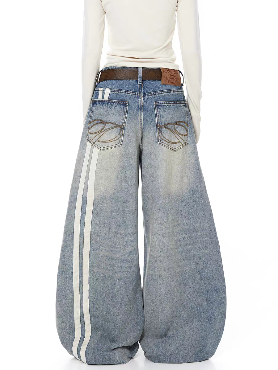 Washed blue wide-leg denim jeans with side stripes — women's streetwear
