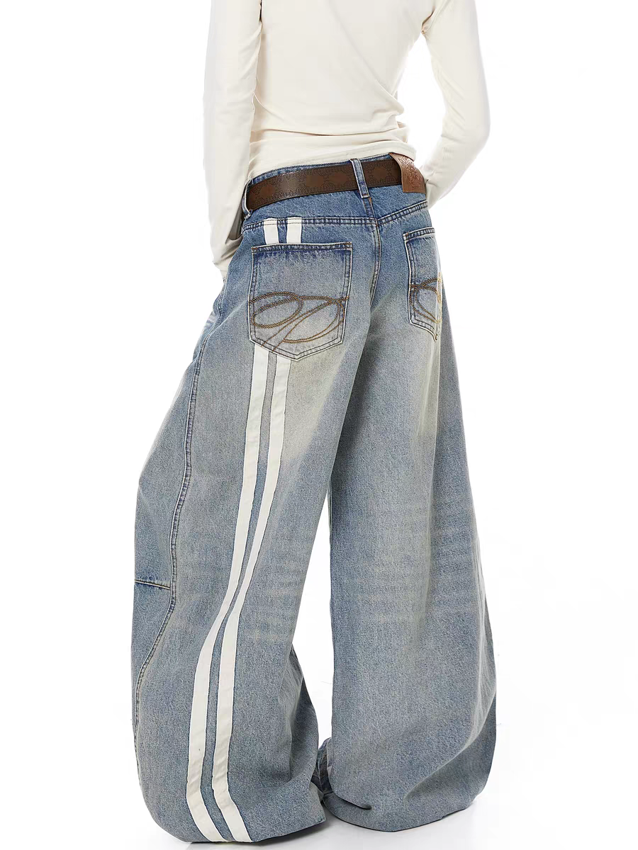 Washed blue wide-leg denim jeans with side stripes — women's streetwear