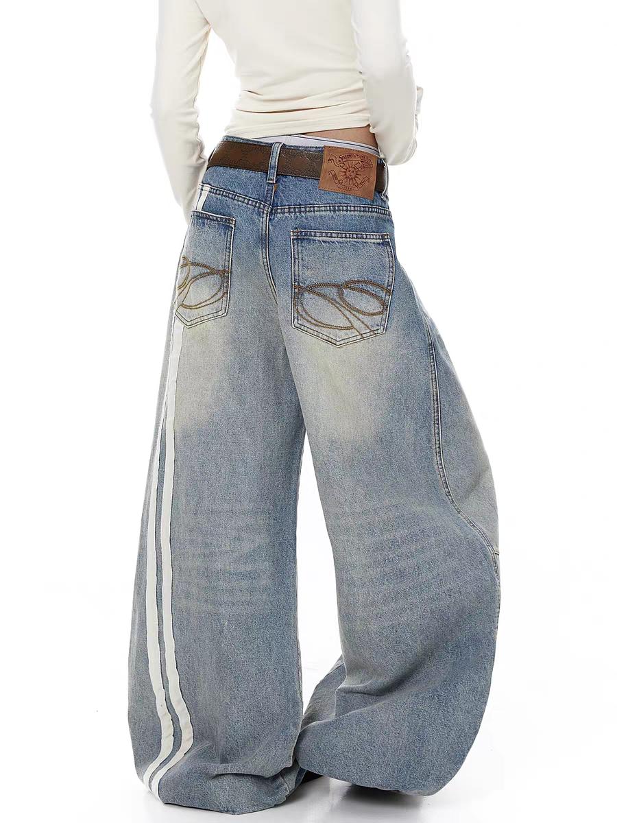 Washed blue wide-leg denim jeans with side stripes — women's streetwear
