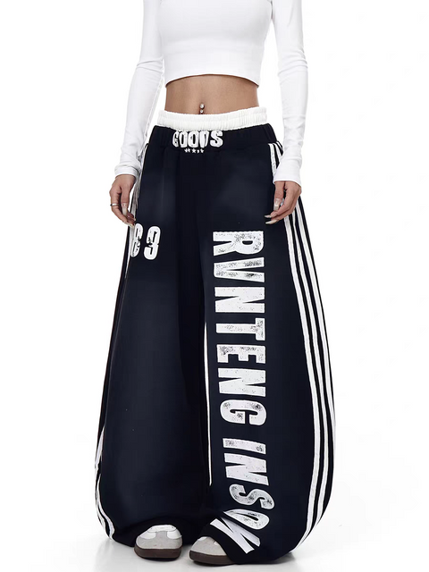 GKIKZ X RVNTENG™ GRAPHIC STRIPE WIDE-LEG TRACK PANTS