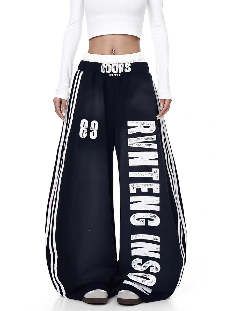 GKIKZ X RVNTENG™ GRAPHIC STRIPE WIDE-LEG TRACK PANTS