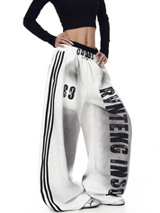 GKIKZ X RVNTENG™ GRAPHIC STRIPE WIDE-LEG TRACK PANTS