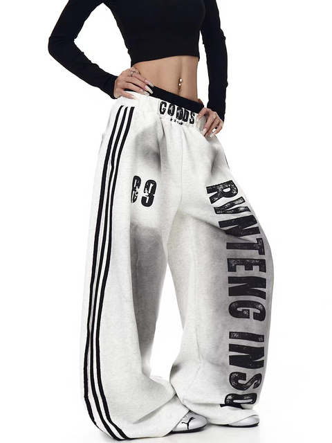 GKIKZ X RVNTENG™ GRAPHIC STRIPE WIDE-LEG TRACK PANTS