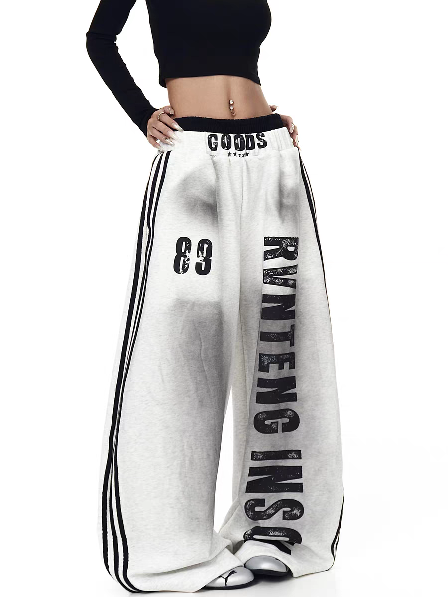 GKIKZ X RVNTENG™ GRAPHIC STRIPE WIDE-LEG TRACK PANTS
