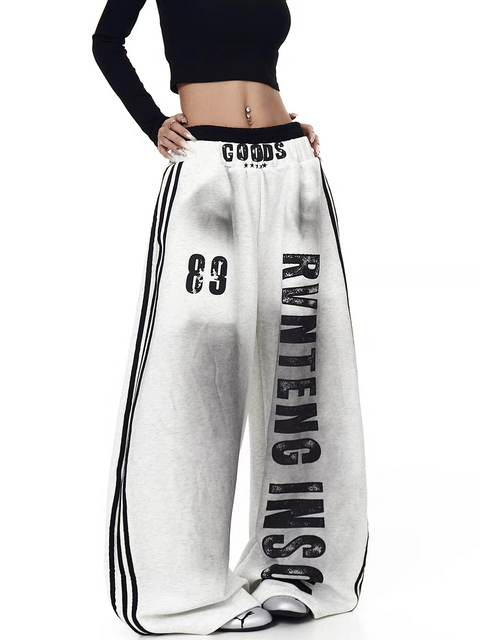 GKIKZ X RVNTENG™ GRAPHIC STRIPE WIDE-LEG TRACK PANTS