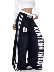 GKIKZ X RVNTENG™ GRAPHIC STRIPE WIDE-LEG TRACK PANTS