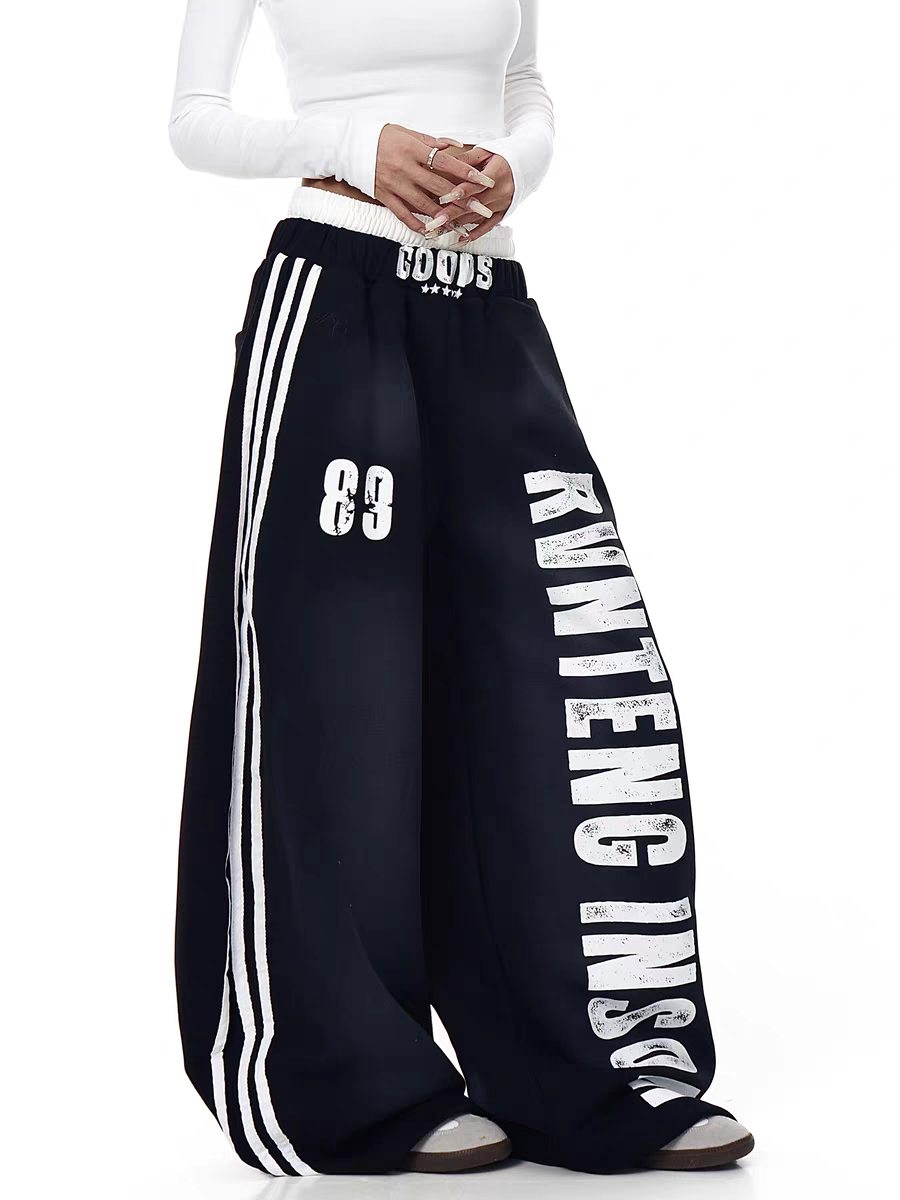 GKIKZ X RVNTENG™ GRAPHIC STRIPE WIDE-LEG TRACK PANTS
