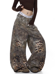 GKIKZ DISTRESSED LEOPARD WIDE-LEG DENIM