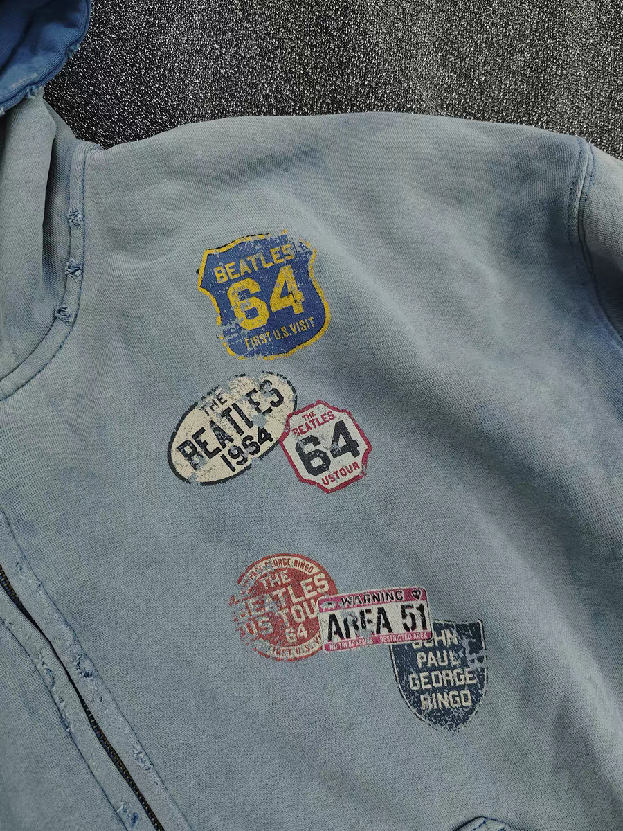 GKIKZ VINTAGE BADGE-PRINT DISTRESSED JACKET