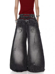 Raw-Edge Embroidered Distressed Jeans